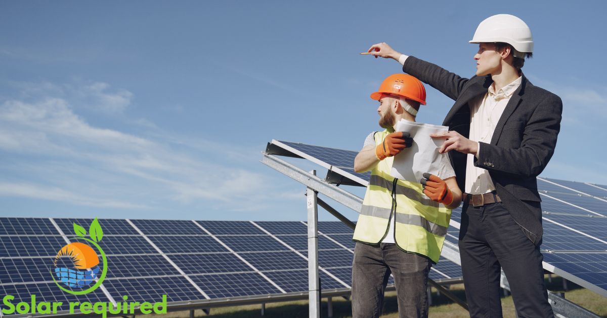 two man check the solar panel performance