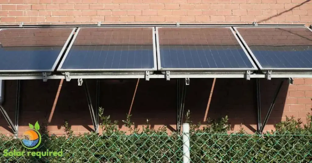 Solar panels installed on building roof, capturing sunlight for sustainable power.